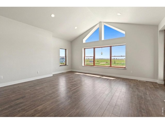 Property Photo 22 Spacious living room (Furnishings removed with AI)