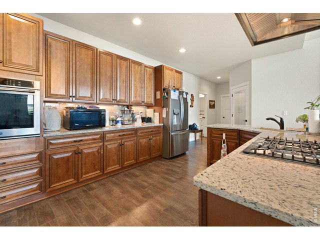 Property Photo 24 Granite countertops and stainless steel appliances