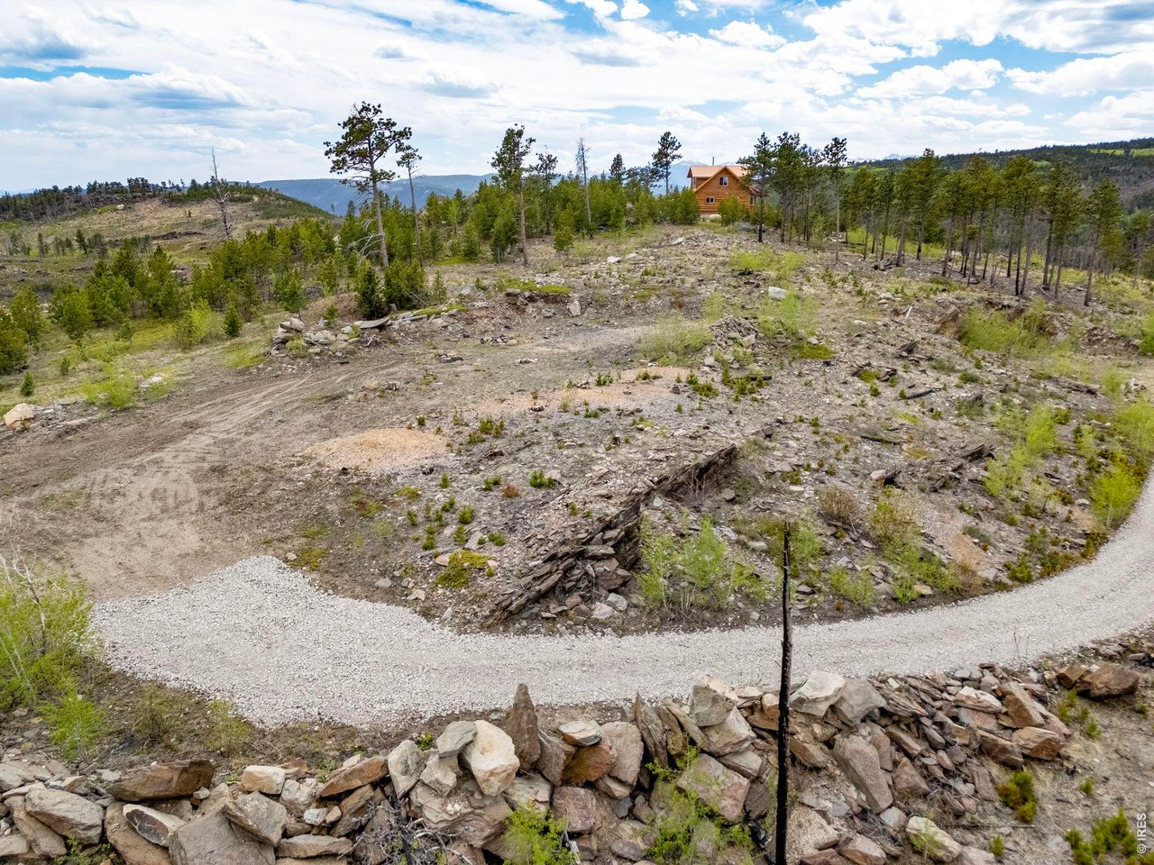 Driveway leads to the best location for building or just use it as a base camp for recreational use!