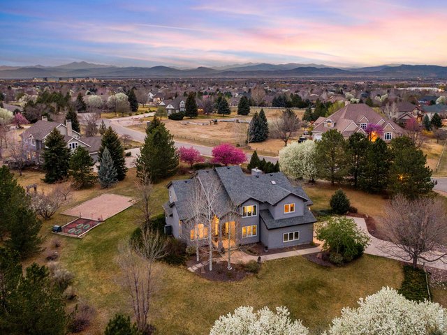 Property Photo 21 Tucked away on private lot in desirable Highland Hills, an exceptional residence offering a rare blend of privacy, space + refined comfort on nearly a full acre within the Poudre School District. 4,741 finished square feet, 5 Bdrms & 5 Baths
