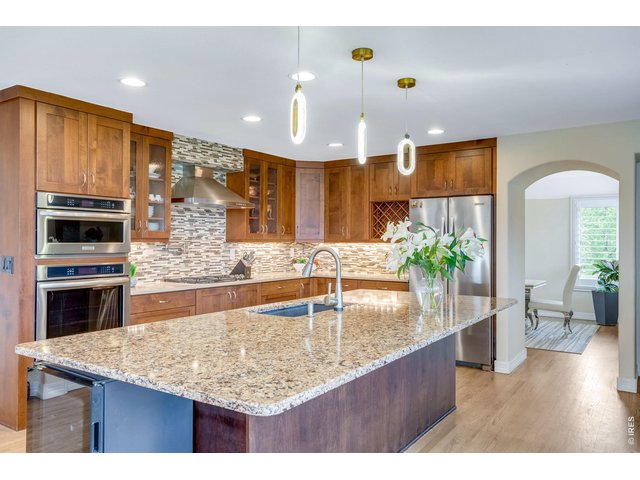 Property Photo 4 Anchored by a stunning HighCraft eat-in kitchen remodel at the heart of the main level, thoughtfully designed for both everyday comfort and elevated entertaining.