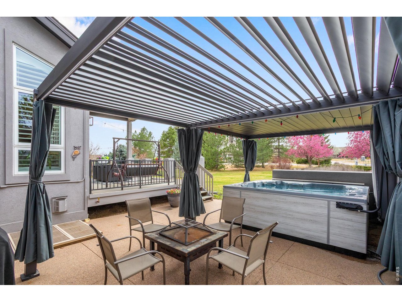 This outdoor oasis is nearly 500 SQFT, also features the perfect sitting area and additional gas line for convenient BBQs