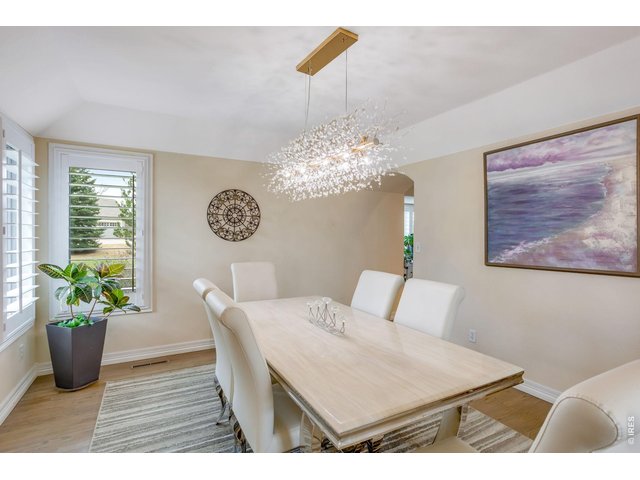 Property Photo 22 Elegant modern new lighting, crisp paint - newly refinished hardwood floors, formal dining!