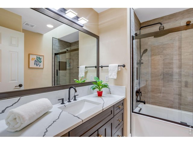 Property Photo 47 Upper Secondary Bathroom, shiny Quartz countertops, modern remodel/updates finishes and bidet toilets