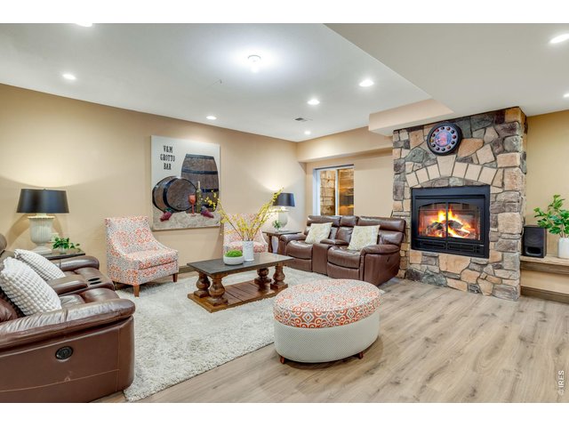 Property Photo 42 Low maintenance LVP flooring, 2nd cozy gas fireplace, large timbered out window wells