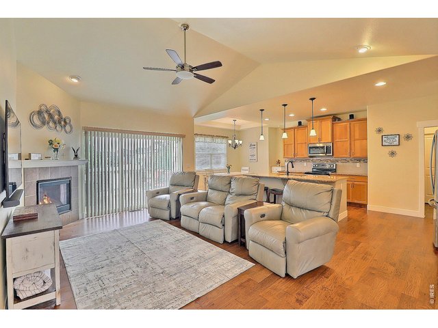 Property Photo 6 Step Into a Spacious and Open Floor Plan with Vaulted Ceilings