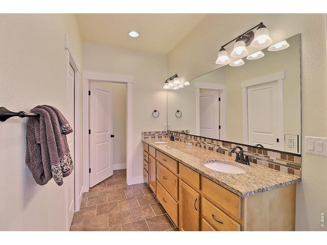 Property Photo 25 Primary Bathroom with Dual Sink Vanity