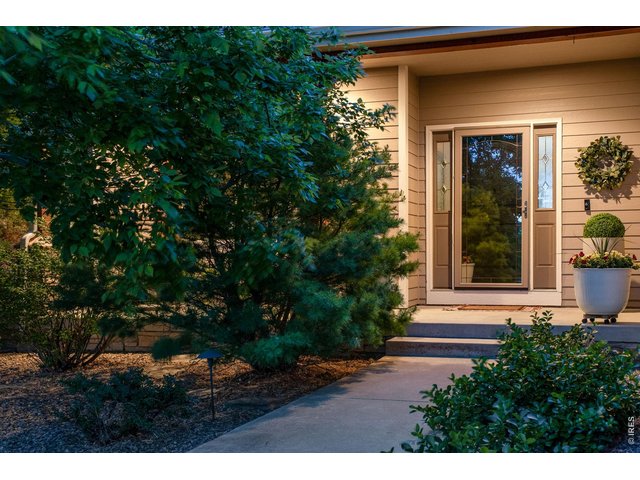 Property Photo 3 Newer 2024 Exterior paint, and generous covered front patio area. All interior doors solid Alder, custom Burford Homes at nearly 1,900 finished and nearly 3,500 Total SQFT. 