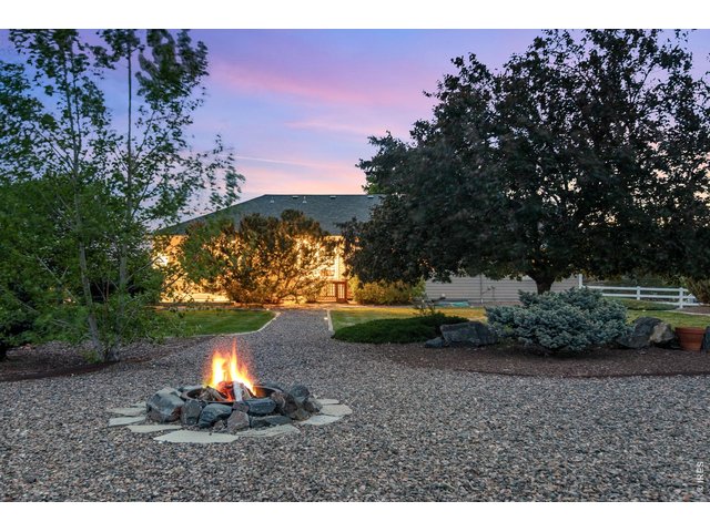 Property Photo 5 in ground firepit, on 2.39 acres - endless options for outdoor living abound! 