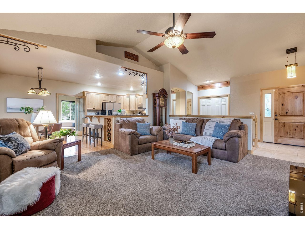 Fresh interior paint, pretty Mission style or Frank Lloyd Wright inspired light fixtures. 