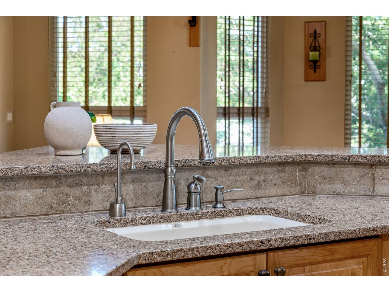 Instant hot - for the intentional cook, Quartz silestone countertops and travertine splash.