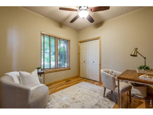 Property Photo 41 Spacious Secondary Bedroom or great office - solid hickory floors.