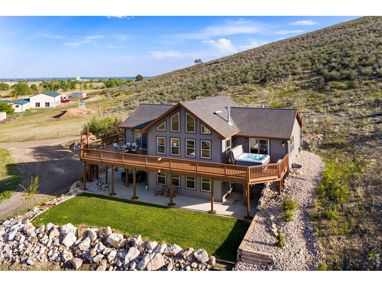 Completely remodeled property with an expansive deck and numerous patios
