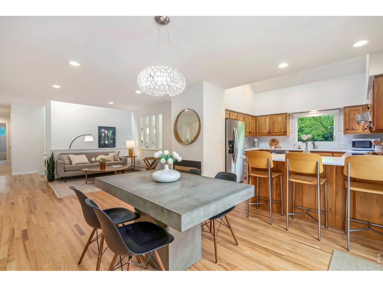 Open floorplan with newly updated lighting, and new flooring and paint throughout. 