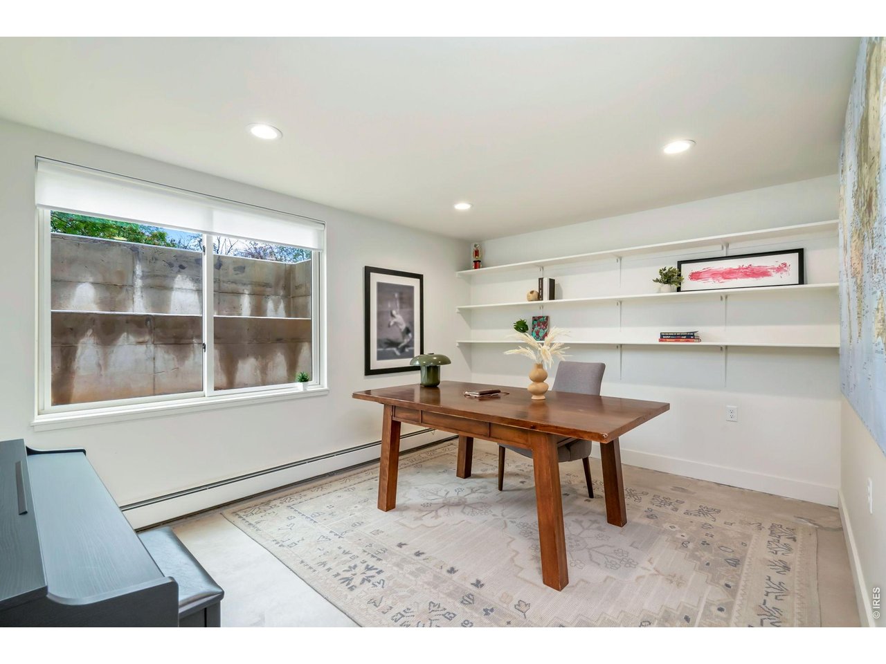 One of two additional basement bedrooms with modern recess lighting, massive egress windows, and a walk-in closet. 
