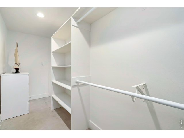 Property Photo 34 Walk-in closets in both additional bedrooms in the basement. 