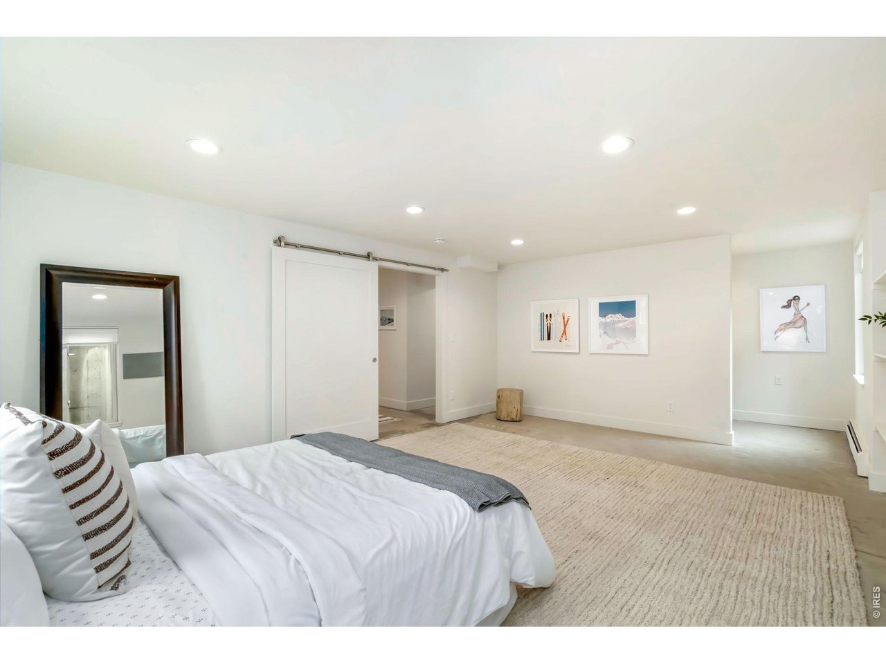 Basement level bedroom #2 with a new modern door for privacy. 