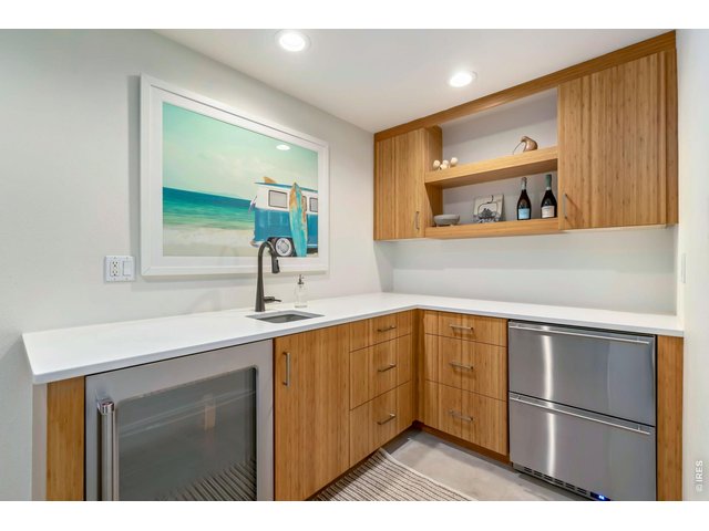 Property Photo 35 Basement level bar area - perfect for entertaining!