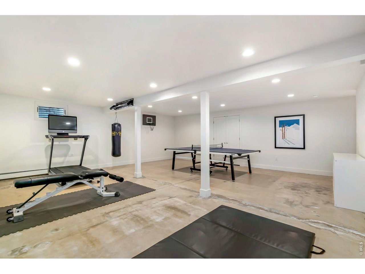 Updated lighting, oversized gym area in the basement. 