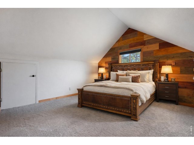 Property Photo 15 Digitally staged Primary bedroom 