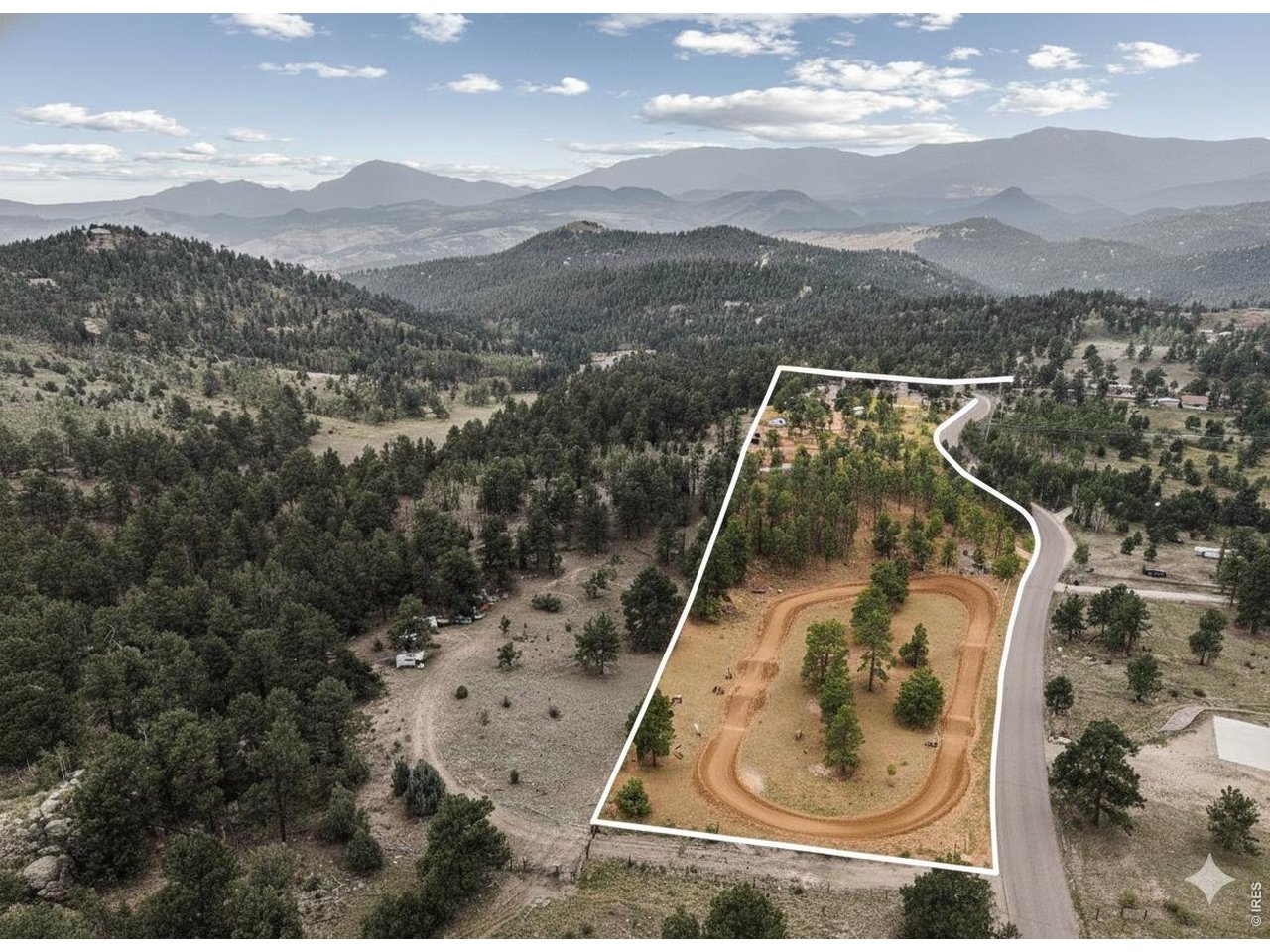 Previous sellers rode dirt bikes on the property so digitally created dirt bike track added to show an option for lower pasture.