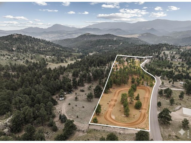 Property Photo 48 Previous sellers rode dirt bikes on the property so digitally created dirt bike track added to show an option for lower pasture.