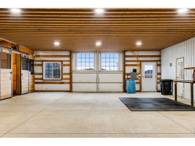 Property Photo 16 Tack room, hay storage, wash bay, 6 stalls...
