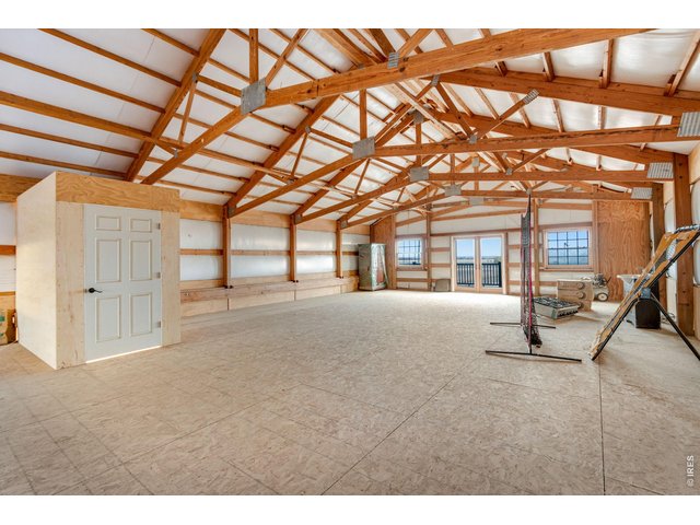 Property Photo 18 2,232 sq ft loft above barn. Can easily be finished into a party loft/barn.
