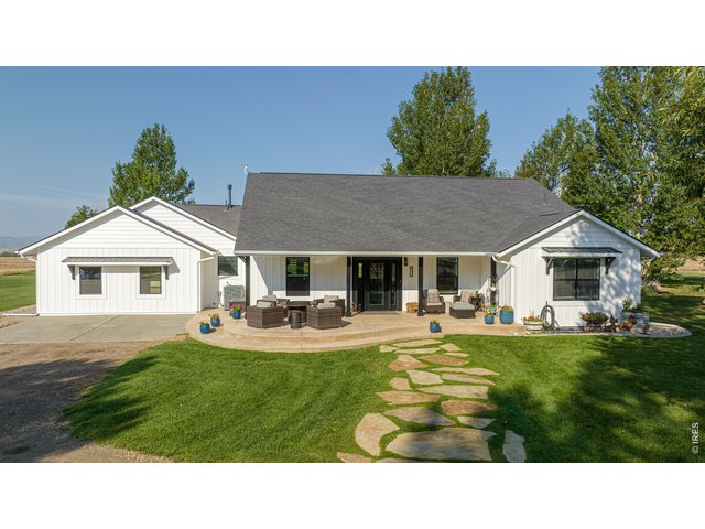 Property Photo 20 The primary residence showcases a split floor plan, front office, formal dining, white trim, new windows & doors, upgraded lighting, new paint & carpet.