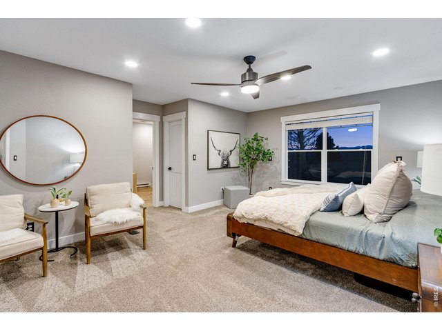 Property Photo 35 Luxurious primary bedroom with retreat featuring a 5-piece bath and two walk-in closets.