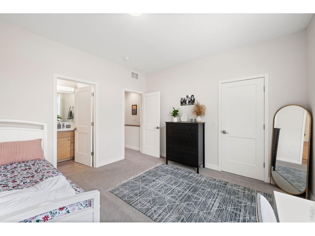 Secondary bedroom with en suite full bath