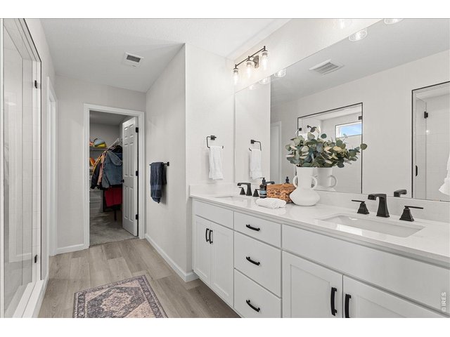 Property Photo 29 Primary Bath w/ dual sinks 