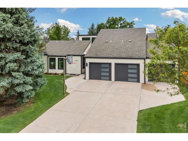 Property Photo 39 The three-car attached garage offers ample space for storing all your water toys. 