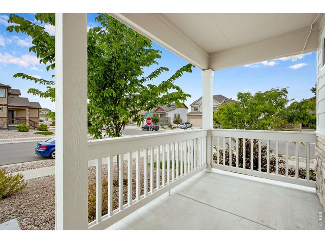 Property Photo 3 Covered front patio