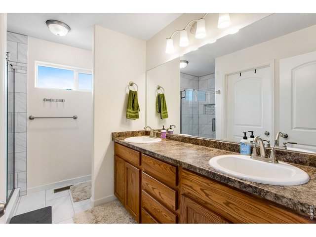 Property Photo 27 Double sinks in primary bathroom