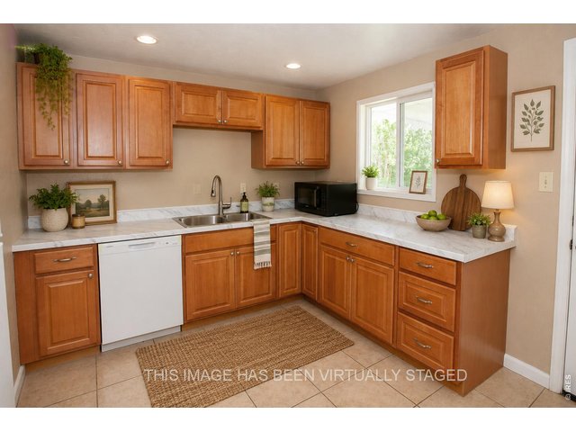 Property Photo 12 Kitchen-virtually staged
