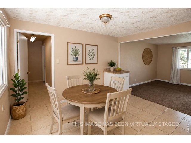 Property Photo 16 Dining-virtually staged