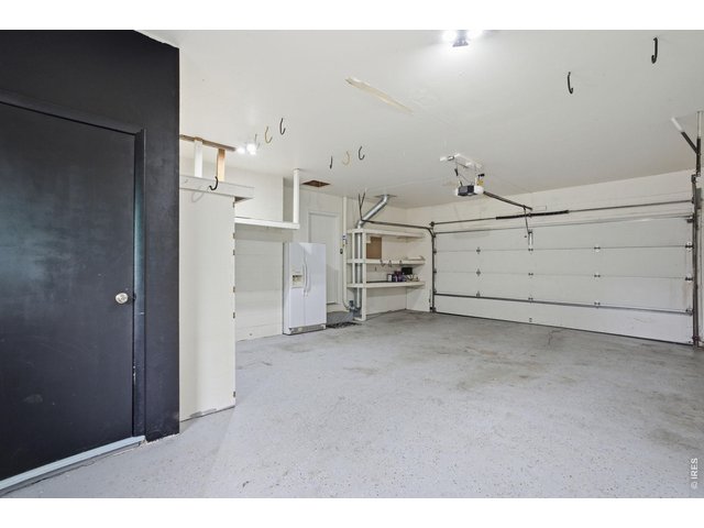 Property Photo 31 Oversized 2-car attached garage with an entrance to the mother-in-law suite in the basement