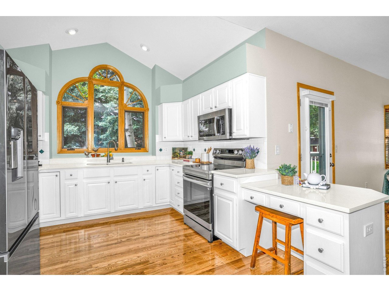 The Kitchen boasts a large picture window that brings the outdoors in!