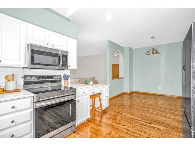 Property Photo 8 The beautiful/well-maintained wood floors echo the pride of ownership seen throughout the home!