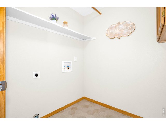 Property Photo 14 The laundry room completes the main floor space 