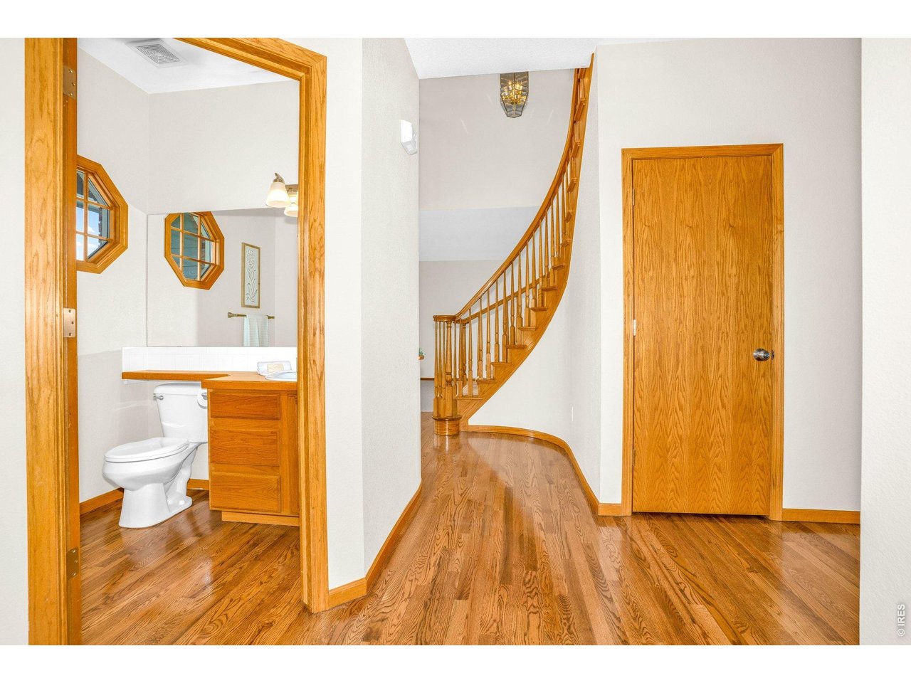 A half bath sits centrally on the main floor. 