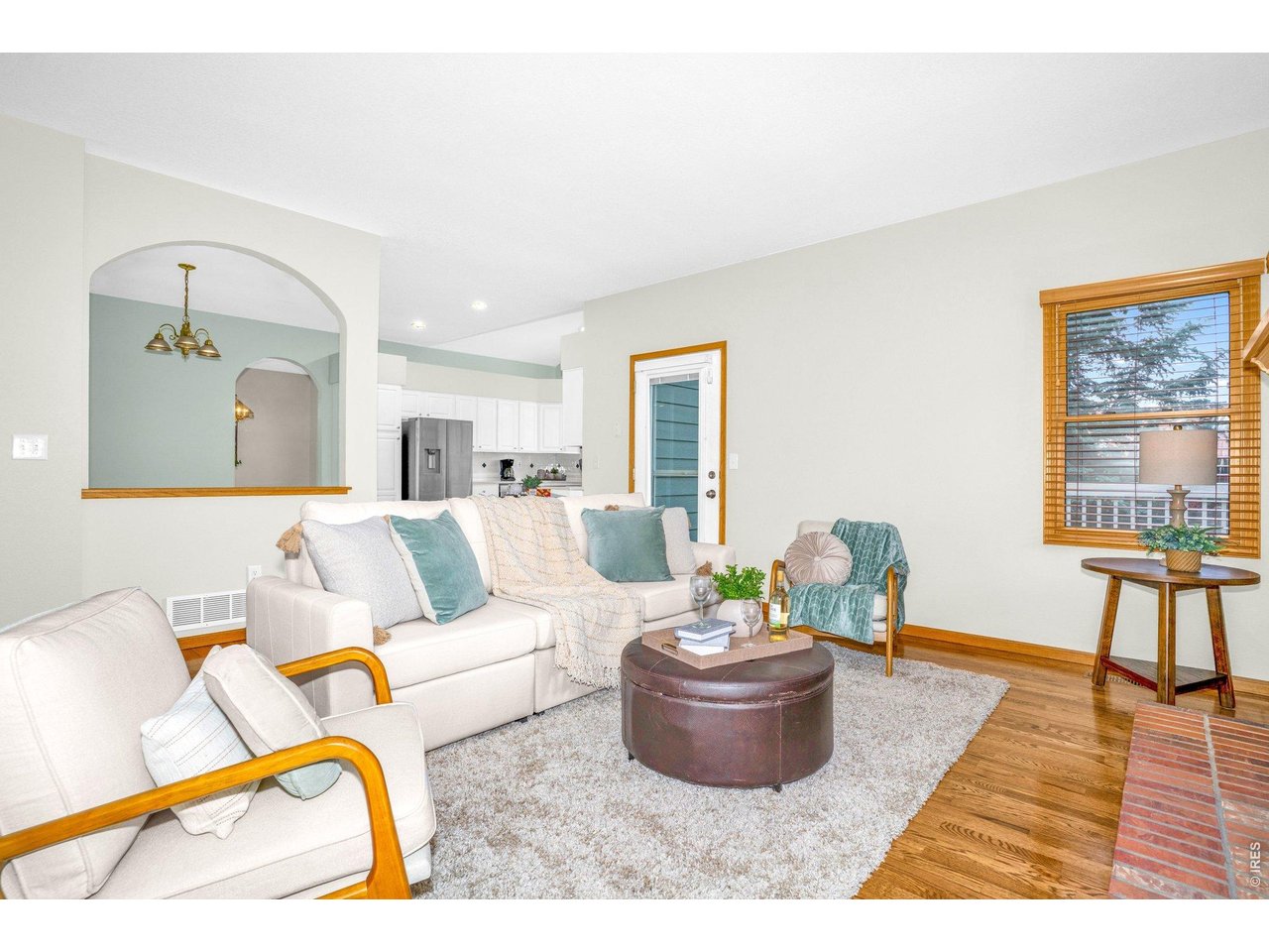 There is an open floor plan between the family room, kitchen, and dining room. 
