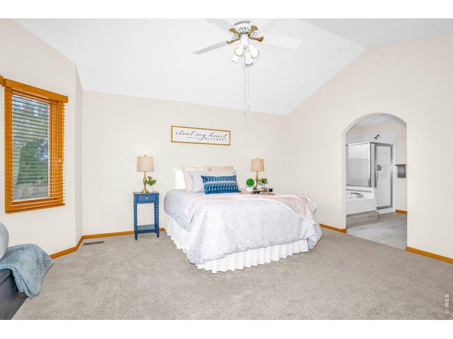 Property Photo 17 The primary bedroom has it's own ensuite and walk in closet