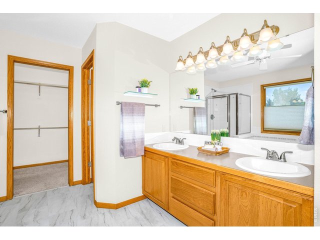 Property Photo 19 dual sinks, and newer lighting! 