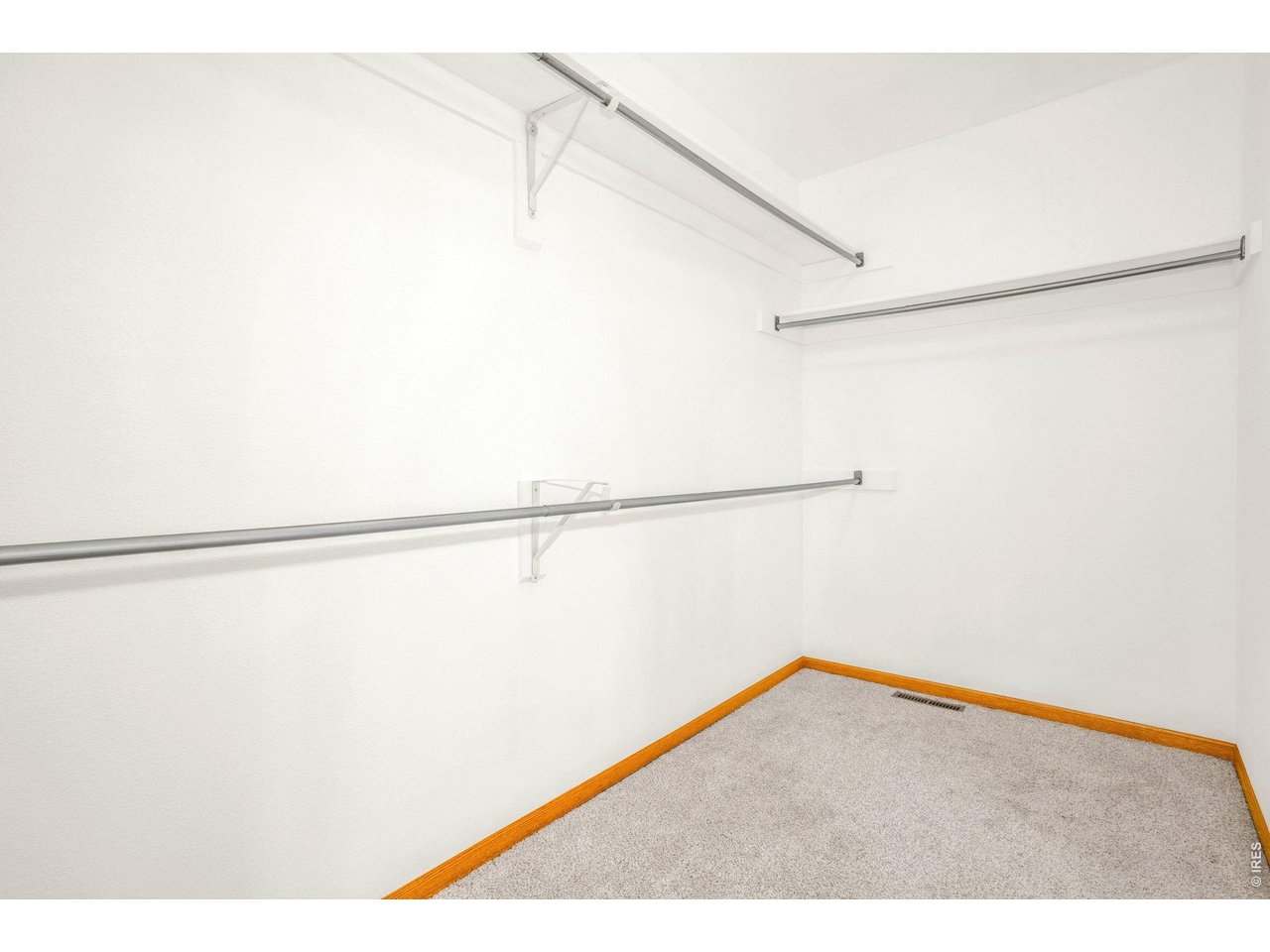 The primary walk-in closet has all the room you need!