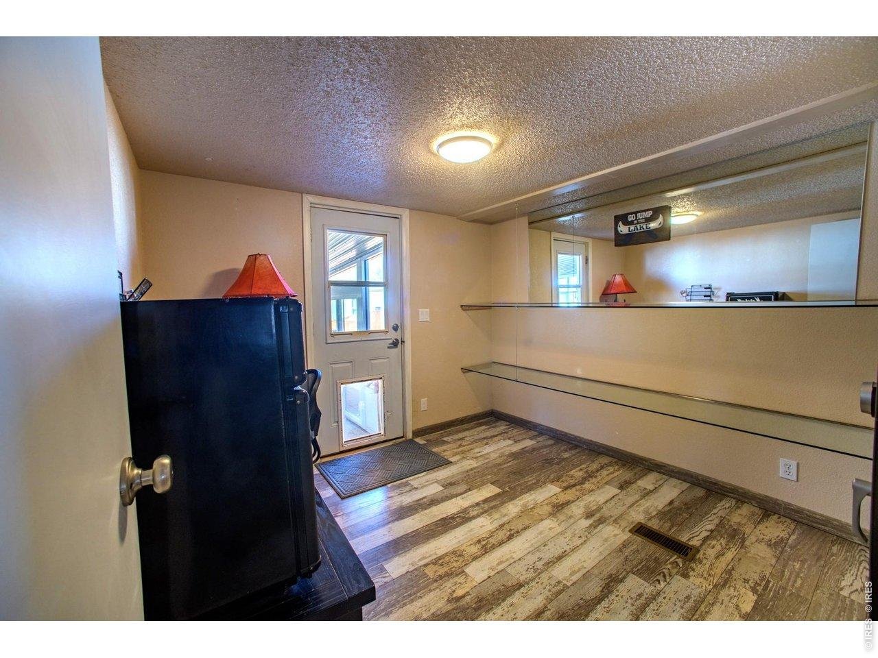 Bedroom three with access to back patio