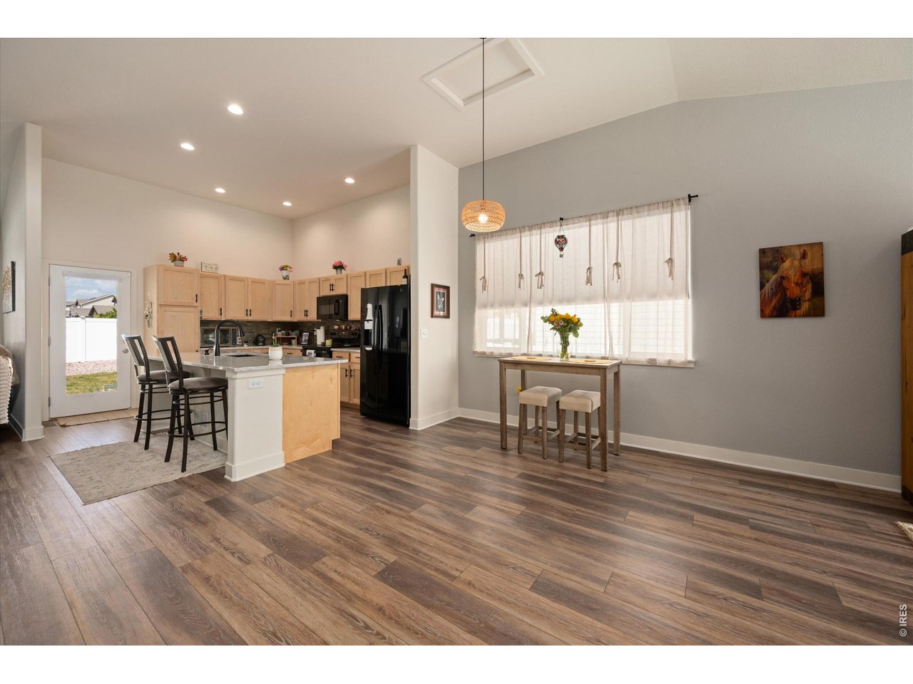 Opens to Kitchen Eating Area & Living Room Space- Upgraded/New Light Fixtures!