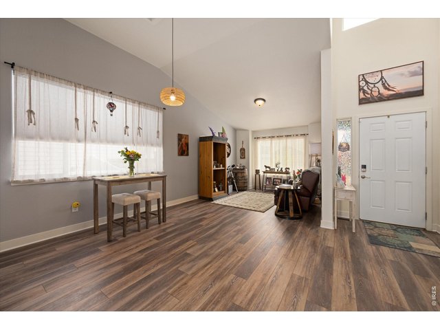Property Photo 10 View from Kitchen Towards Entry Way-Open Floor Plan Living!