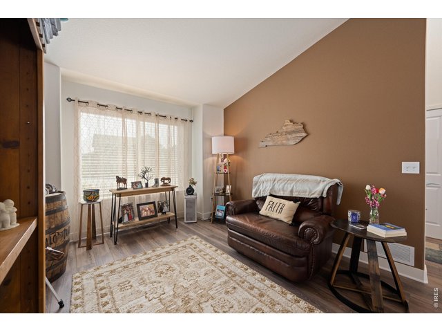 Property Photo 11 Living Room with Large Front Window